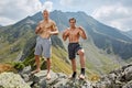 Kickboxers or muay thai fighters training in the mountains