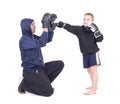 Kickboxing kids with instructor Royalty Free Stock Photo