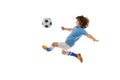 Little boy, football soccer player in action, motion training isolated on white studio background. Concept of sport Royalty Free Stock Photo