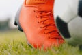 Kicking the soccer ball; close-up and low angle view Royalty Free Stock Photo