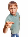 Kid angry boy shows his finger to screen evil is Royalty Free Stock Photo