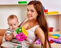 Kid baby boy with mother plying puzzle toy on Royalty Free Stock Photo