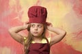 Kid or baby girl in cook or chef hat, apron Royalty Free Stock Photo