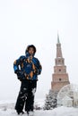 Kid on background of Syuyumbike tower in Kazan Kremlin Royalty Free Stock Photo