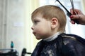 Kid in barber shop Royalty Free Stock Photo