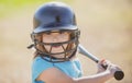 Kid baseball ready to bat. Child batter about to hit a pitch during a baseball game. Royalty Free Stock Photo