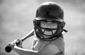 Kid baseball ready to bat. Child batter about to hit a pitch during a baseball game. Royalty Free Stock Photo