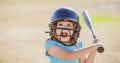 Kid baseball ready to bat. Child batter about to hit a pitch during a baseball game. Royalty Free Stock Photo