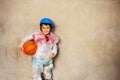 Kid and basketball ball overprotecting bubble wrap