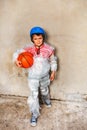 Kid and basketball ball overprotecting bubble wrap