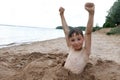 Kid on beach of Lake Seliger