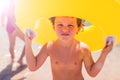 Kid on beach with swimming circle. Children and holiday concept Royalty Free Stock Photo