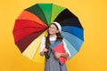 kid in beret with rainbow umbrella. autumn season. rainy weather forecast. back to school. Royalty Free Stock Photo