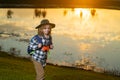 Kid with binoculars hiking at nature. Little explorer. Outdoor recreation and adventures with kids. Child tourist on Royalty Free Stock Photo