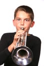 Kid Blowing Trumpet Royalty Free Stock Photo