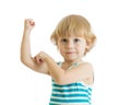 Kid boy child strength training and showing muscles. Royalty Free Stock Photo