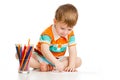 Kid boy drawing with colour pencils Royalty Free Stock Photo