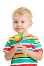 Kid boy eating lollipop isolated Royalty Free Stock Photo