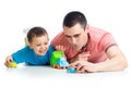 Kid boy and father play with car toys Royalty Free Stock Photo