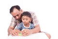 Kid boy and his dad assembly toy car Royalty Free Stock Photo