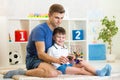 Kid boy holding a radio remote control for