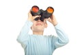 Kid boy looking into binocular Royalty Free Stock Photo