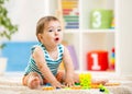 Kid boy playing with block toys indoors Royalty Free Stock Photo