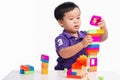 Kid boy playing with blocks from toy constructor isolated Royalty Free Stock Photo
