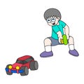 Kid boy is playing a fun remote control car Royalty Free Stock Photo