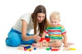 Kid boy playing toys together mother Royalty Free Stock Photo