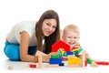 Kid boy playing toys together mother Royalty Free Stock Photo