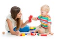 Kid boy playing toys together mother Royalty Free Stock Photo