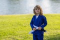 Kid boy practicing martial arts outdoor. Sport martial arts kids. Little boy wearing kimono doing karate in park. Child Royalty Free Stock Photo