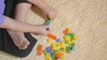 Kid boy preschool playing creative plastic toy blocks Royalty Free Stock Photo