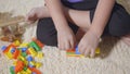 Kid boy preschool playing creative plastic toy blocks Royalty Free Stock Photo