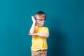 Kid boy show his hand up eager to answer question Royalty Free Stock Photo