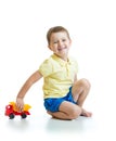 Kid with toy isolated on a white background Royalty Free Stock Photo