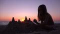 Kid Building Castle on Beach at Sunset, Child Playing Sands on Seaside, Girl Plays by Sea Royalty Free Stock Photo