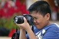 Kid with a camera Royalty Free Stock Photo
