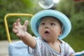 Kid catching soap bubbles Royalty Free Stock Photo