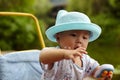 Kid catching soap bubbles Royalty Free Stock Photo