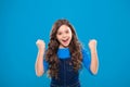 Kid cheerful celebrate victory. Girl cute child long curly hair happy smiling. Child psychology and development. Happy Royalty Free Stock Photo