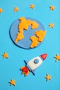 Kid child rocket in space, adventure and science. Stars, planet earth. Plasticine art, cartoon