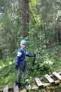 Kid with climbing equipment in summer park Royalty Free Stock Photo