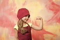 Kid cook flexing hand on colorful wall Royalty Free Stock Photo