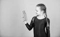 Kid cute girl gymnast sports leotard hold bottle for drink. Water balance and hard gym training. Drink more water. Keep Royalty Free Stock Photo