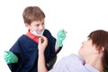 Kid dentist doctor with female patient Royalty Free Stock Photo