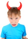 Kid with Devil Horns Royalty Free Stock Photo