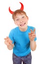 Kid with Devil Horns Royalty Free Stock Photo