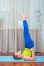 Kid doing fitness exercises Royalty Free Stock Photo